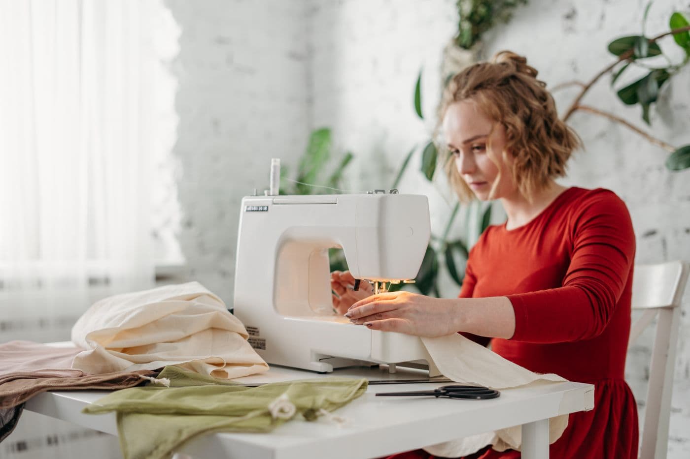 Stitching fabric on a sewing machine